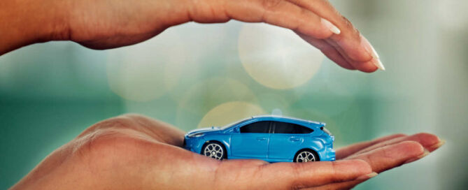 model car in hand