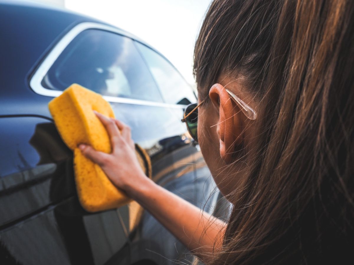 woman washing car